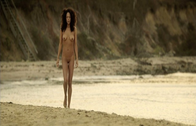 Nate Bova walking naked on the beach